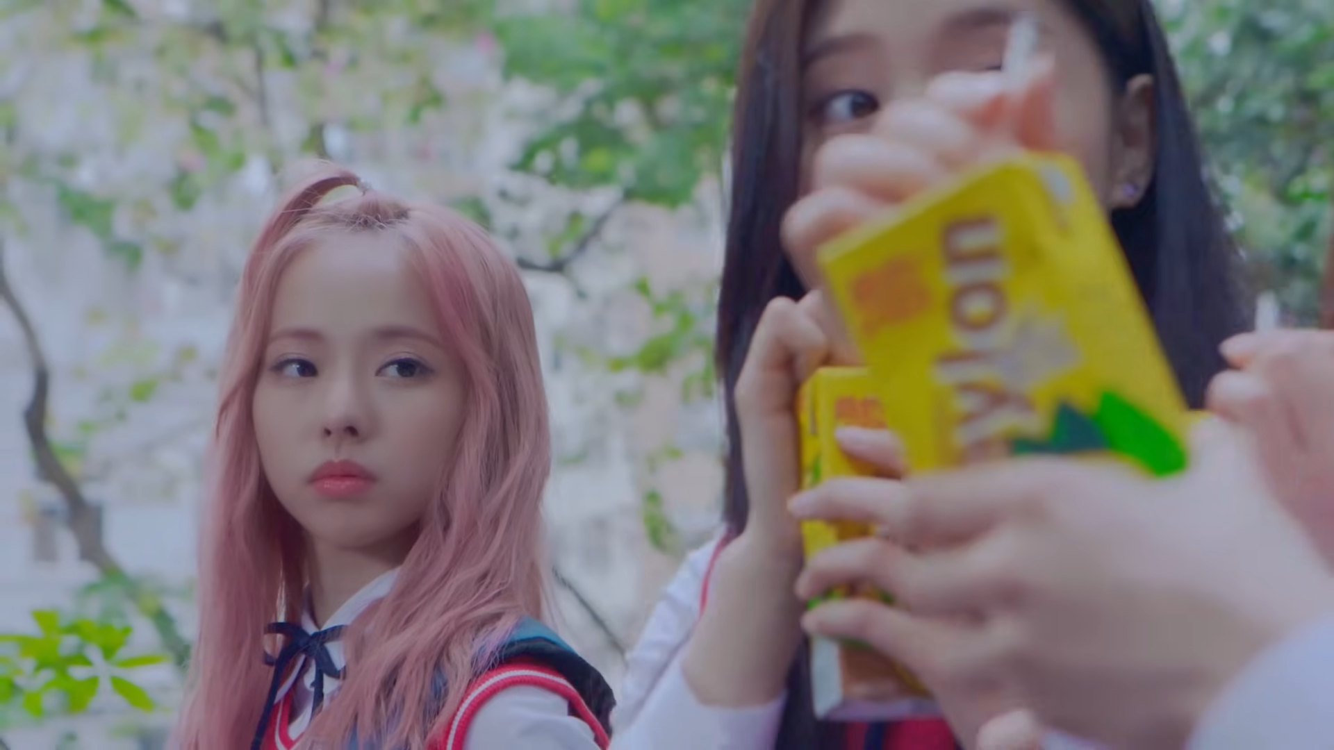 Vivi looking at the others drinking their juice boxes.